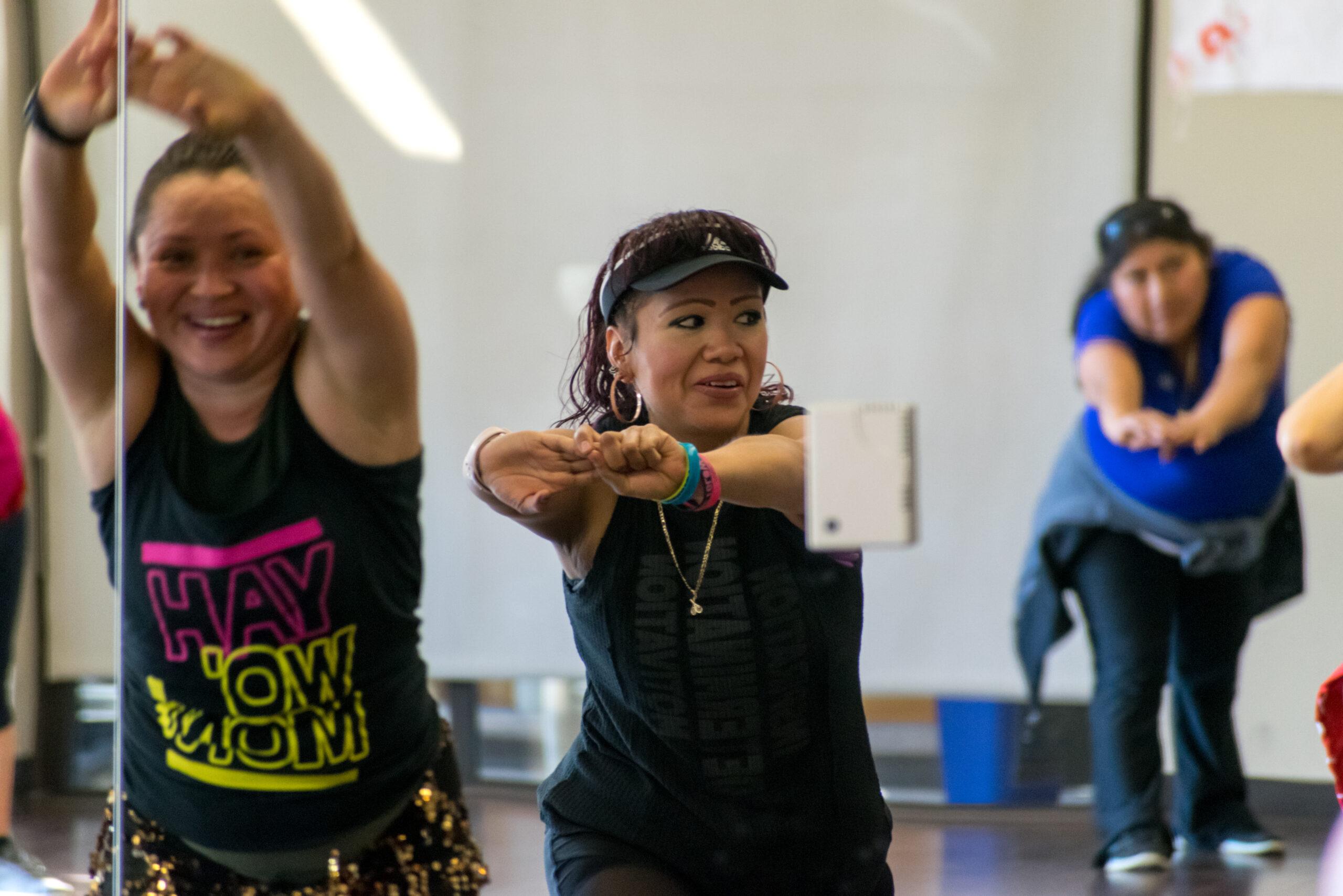ladies doing zumba in a wellness class