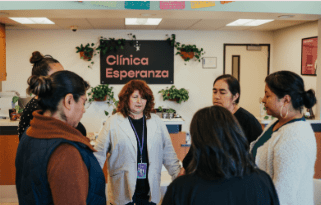 Group of ladies in a circle holding hands