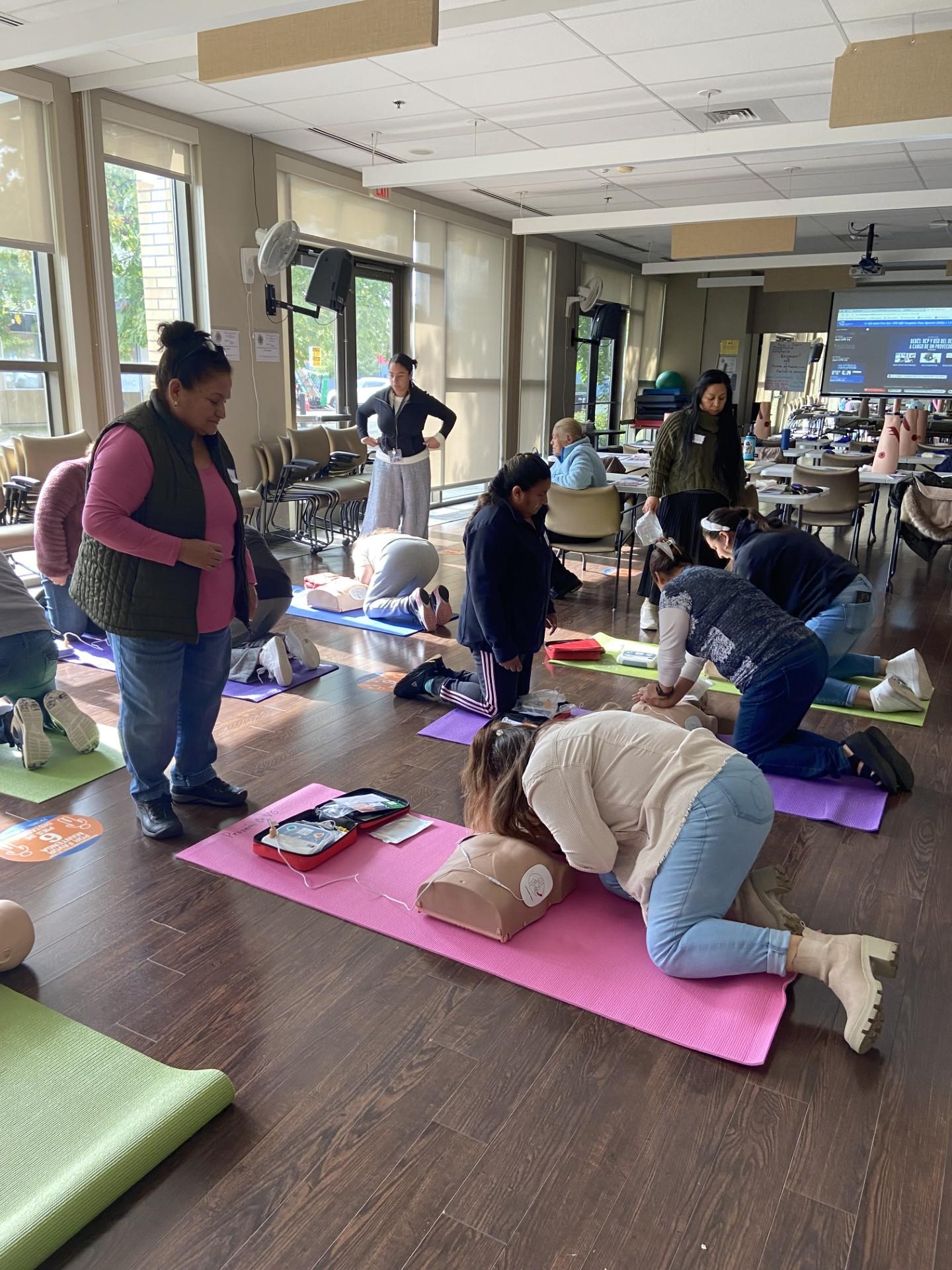 Group of People doing CPR training